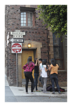 photo of a group of asian teenagers on a corner of Waverly street in San Francisco