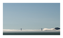 photo of Golden Gate Bridge in fog on a sunny day